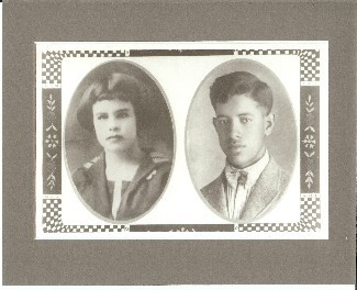 Old black and white photo of two portraits